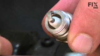 Ryobi Trimmer Repair  How to replace the Spark Plug [upl. by Alag124]